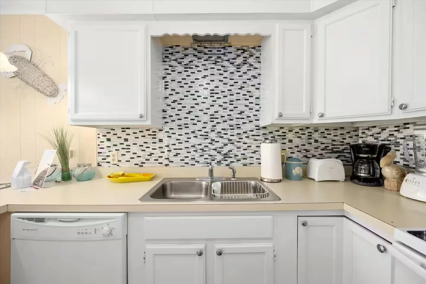 Double sink, dishwasher, and coffee station